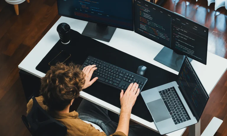 Analyst reviewing customer support performance metrics on screen